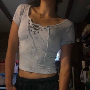 Light blue shirt with cross cross